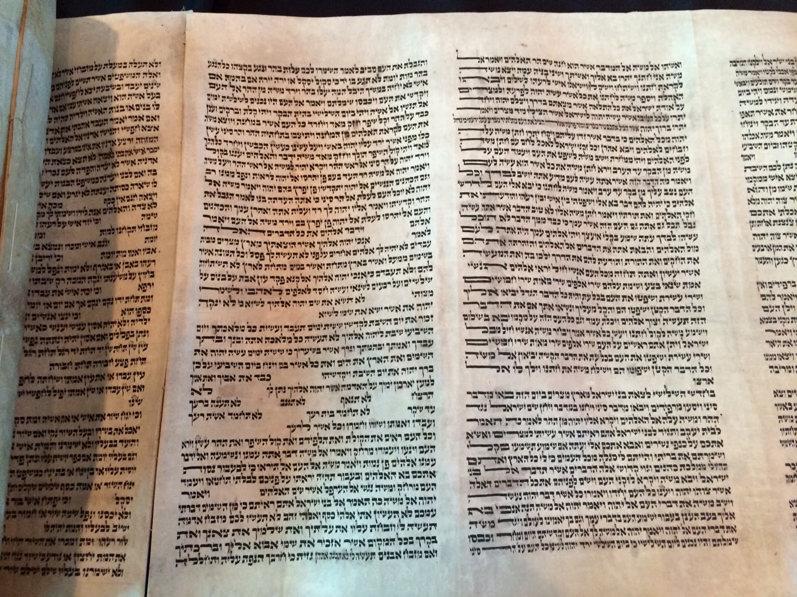 Close-up of Hebrew text on a Torah scroll